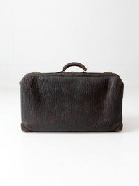antique 1920s black leather suitcase with brass hardware