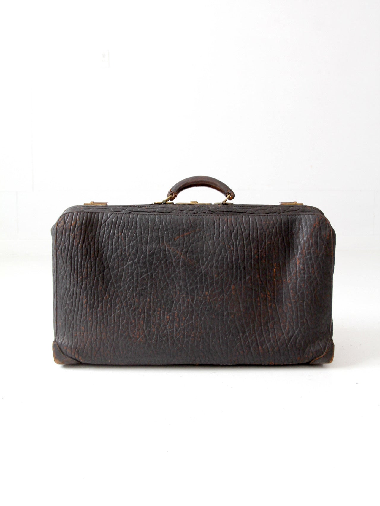 antique 1920s black leather suitcase with brass hardware