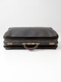 antique 1920s black leather suitcase with brass hardware