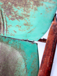 mid-century metal patio chair with cantilever frame