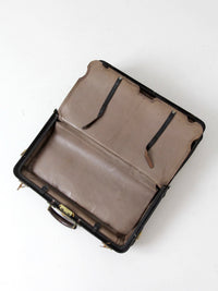 antique 1920s black leather suitcase with brass hardware