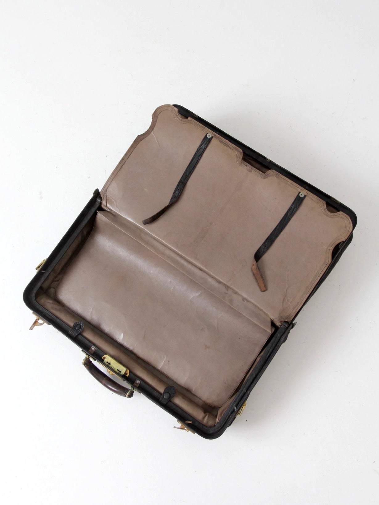 antique 1920s black leather suitcase with brass hardware