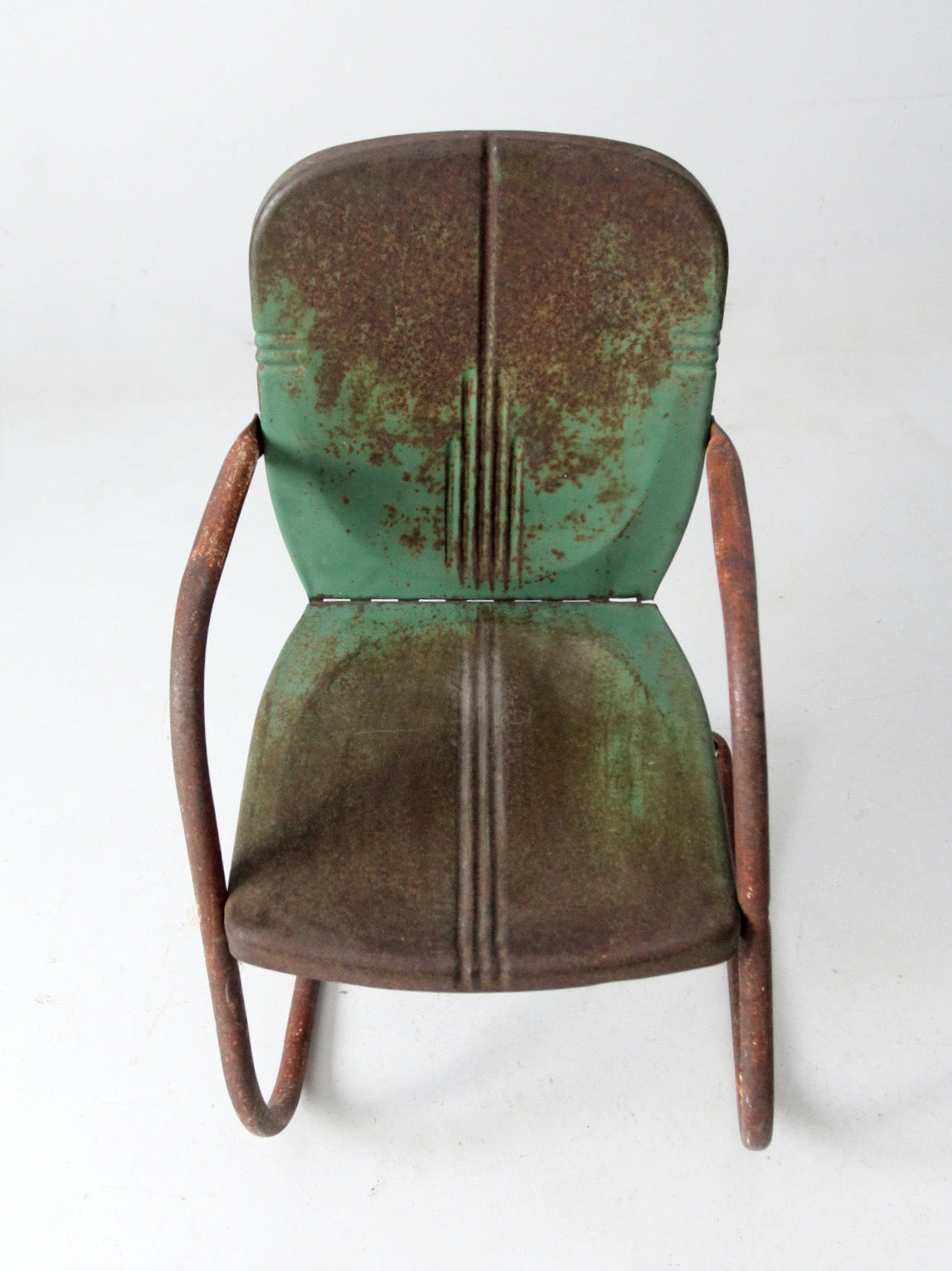 mid-century metal patio chair with cantilever frame
