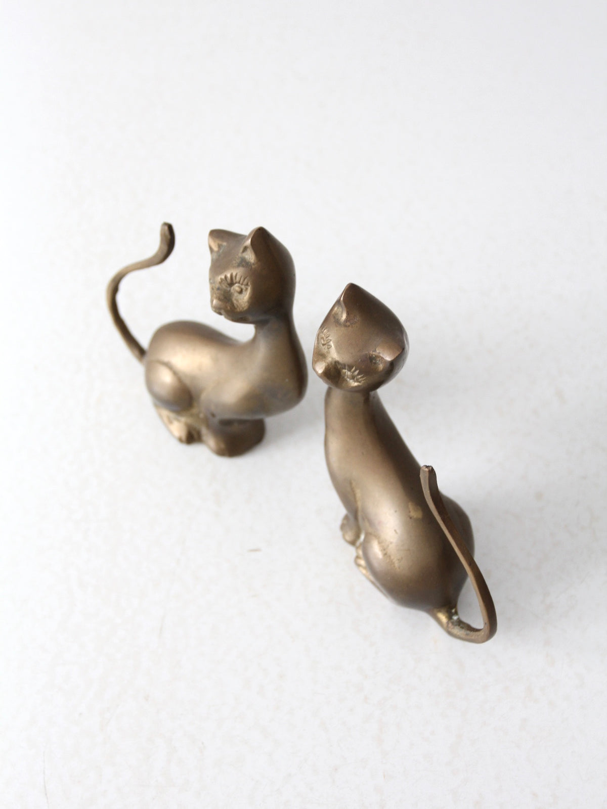 pair of mid-century brass cat figurines