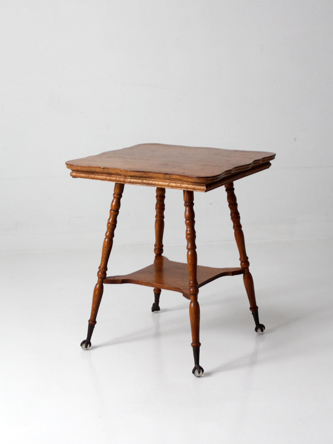 antique Edwardian oak side table ball and claw feet