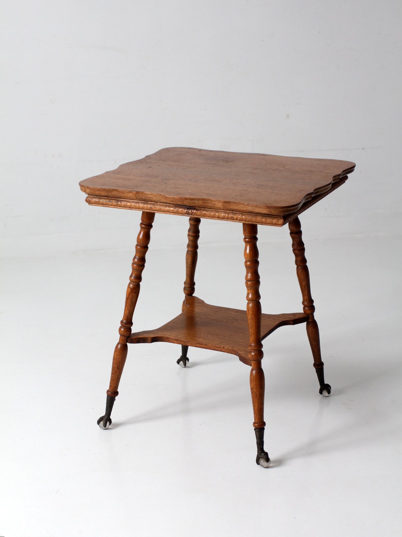 antique Edwardian oak side table ball and claw feet
