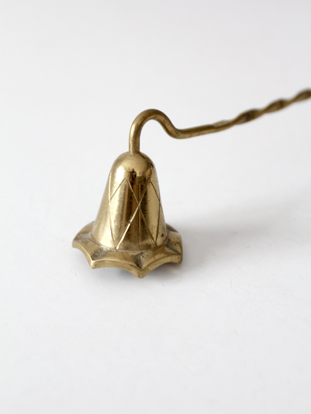 vintage brass candle snuffer with twisted handle