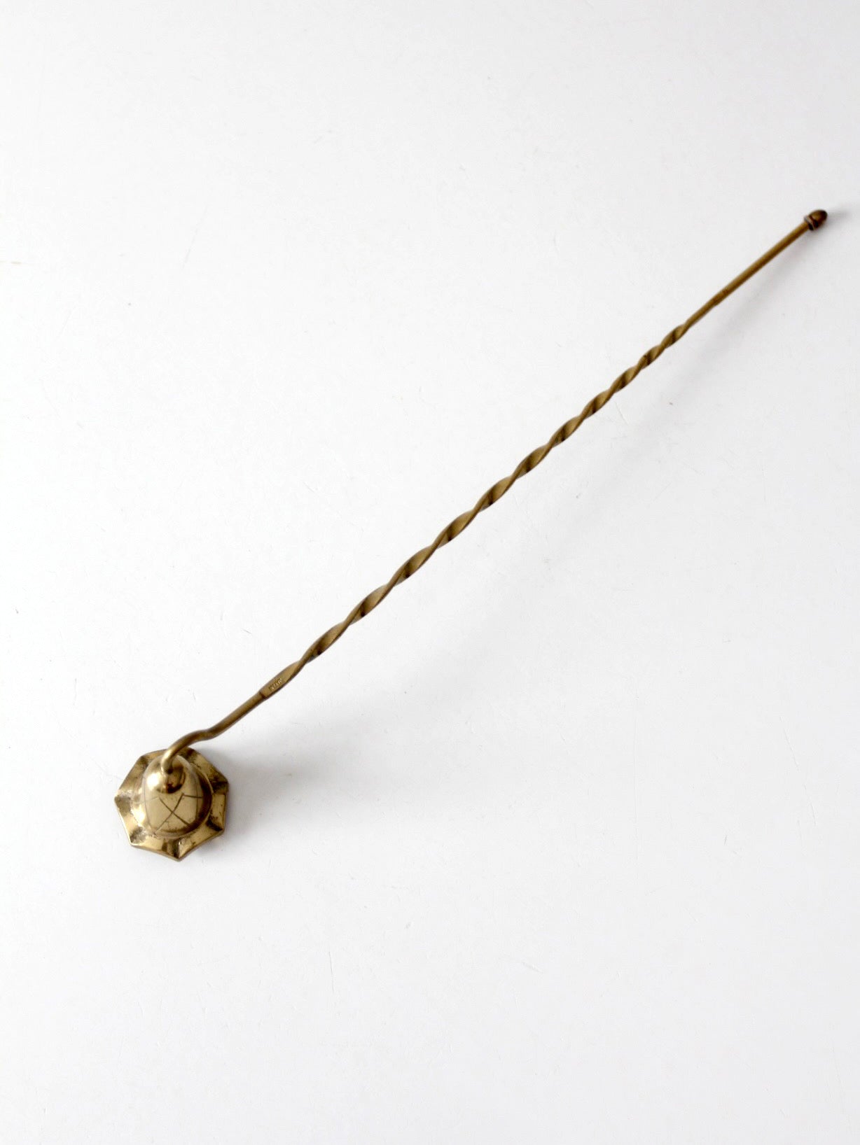 vintage brass candle snuffer with twisted handle