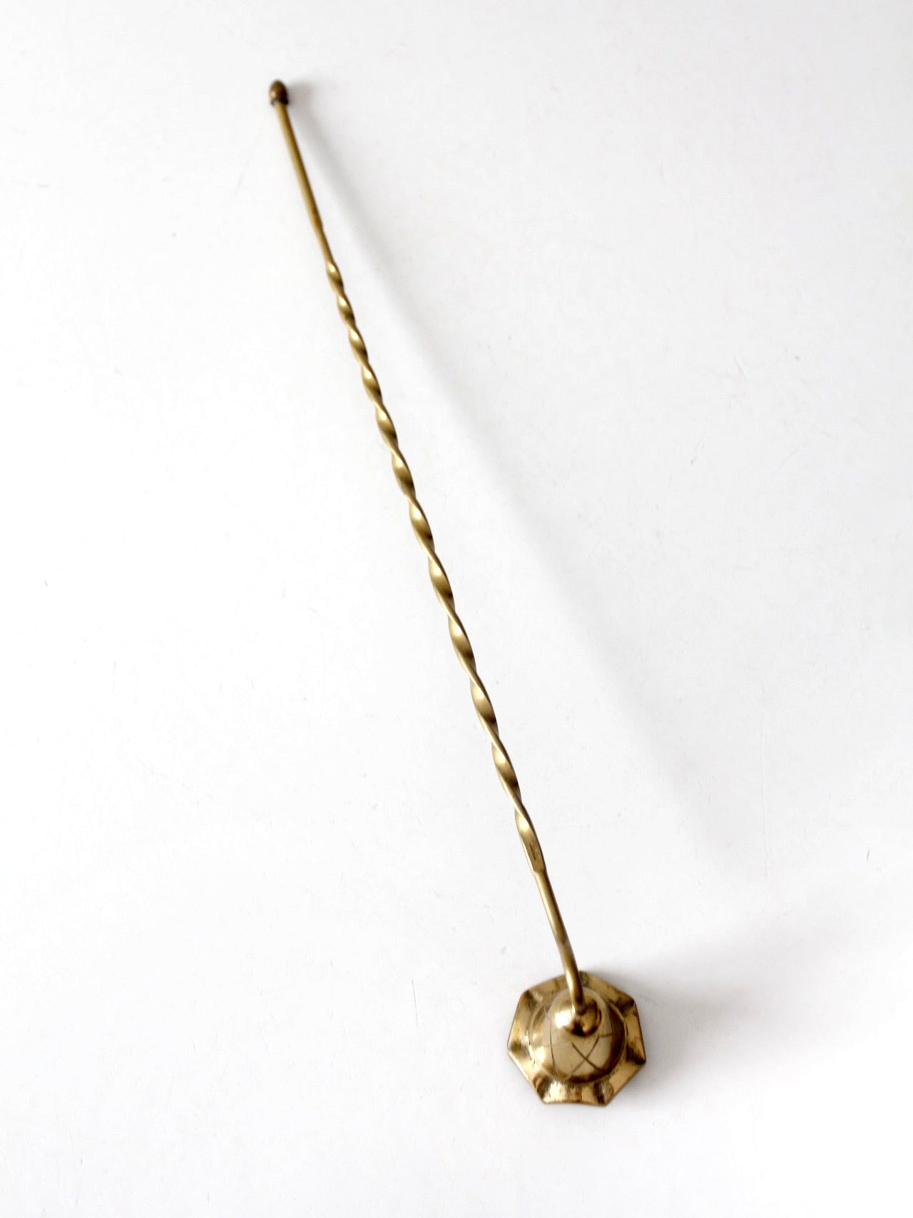 vintage brass candle snuffer with twisted handle