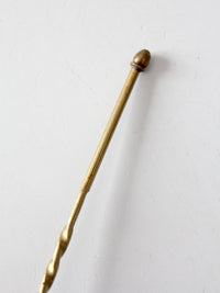 vintage brass candle snuffer with twisted handle