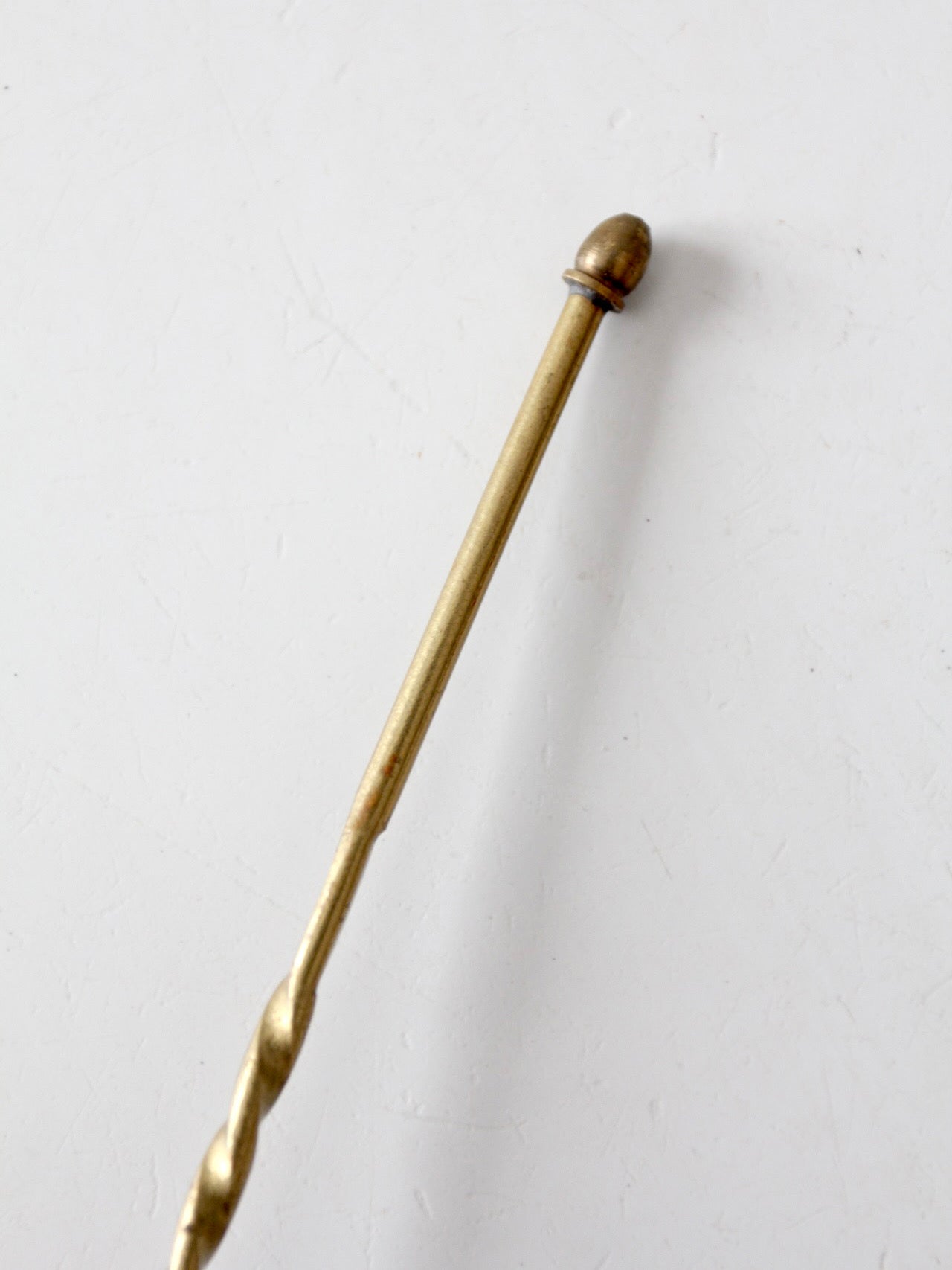 vintage brass candle snuffer with twisted handle
