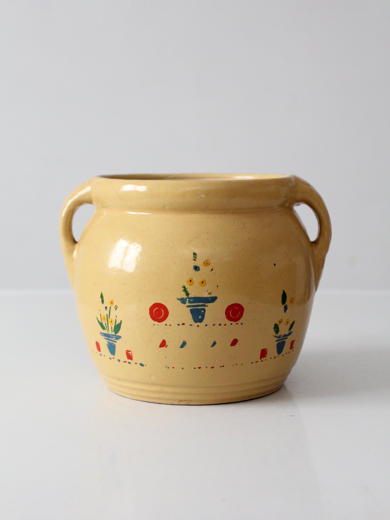 vintage yellow ceramic cookie jar vase with floral design