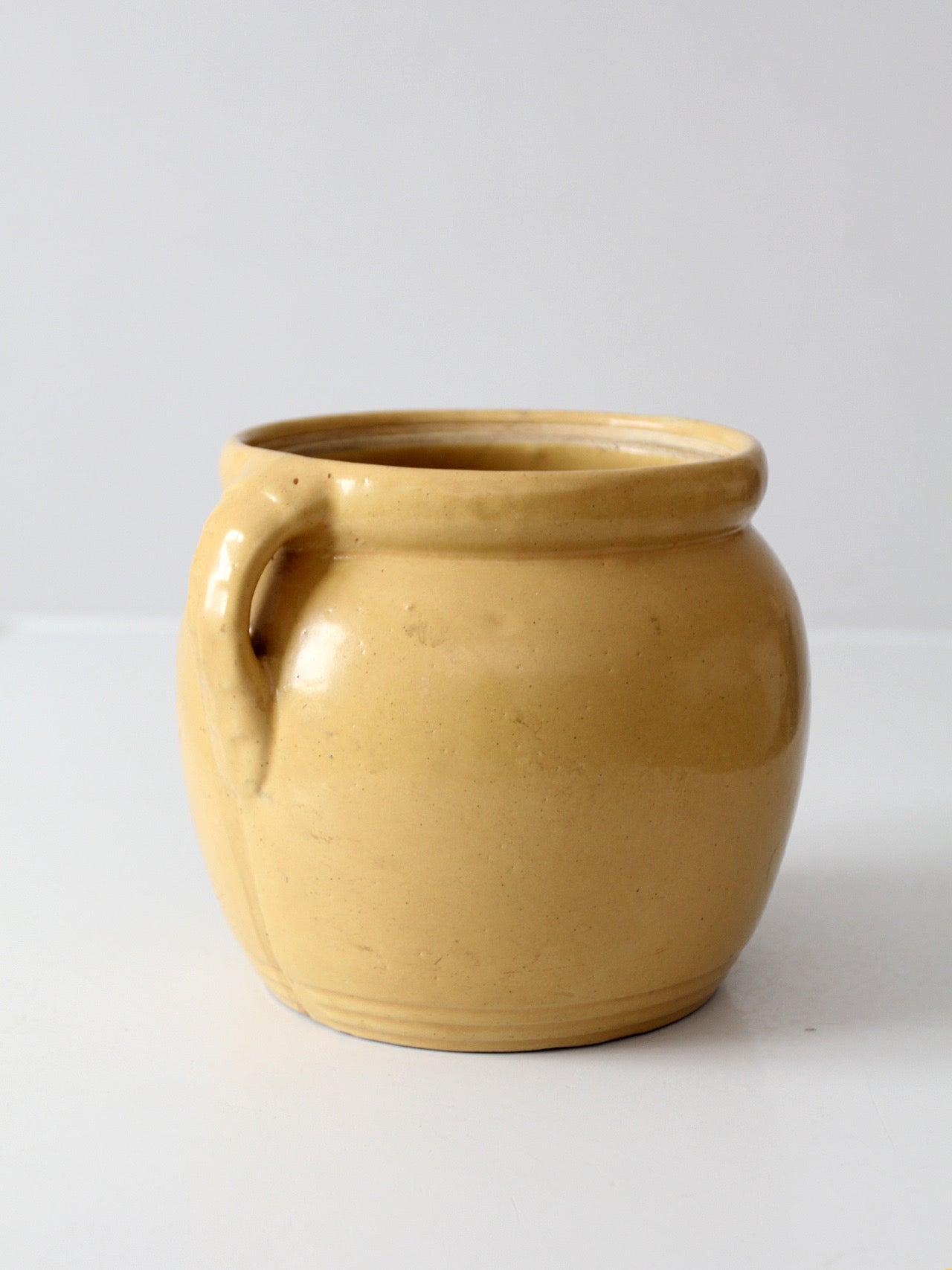 vintage yellow ceramic cookie jar vase with floral design
