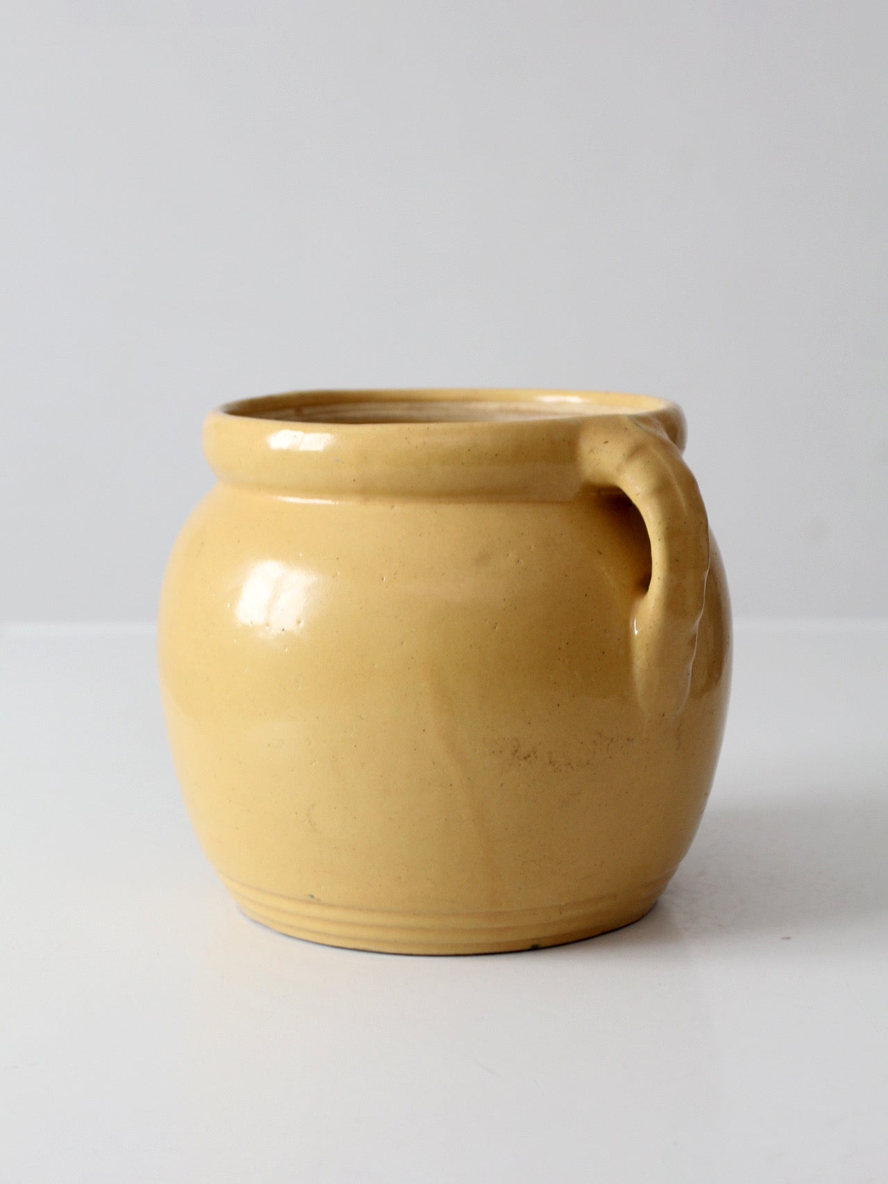 vintage yellow ceramic cookie jar vase with floral design