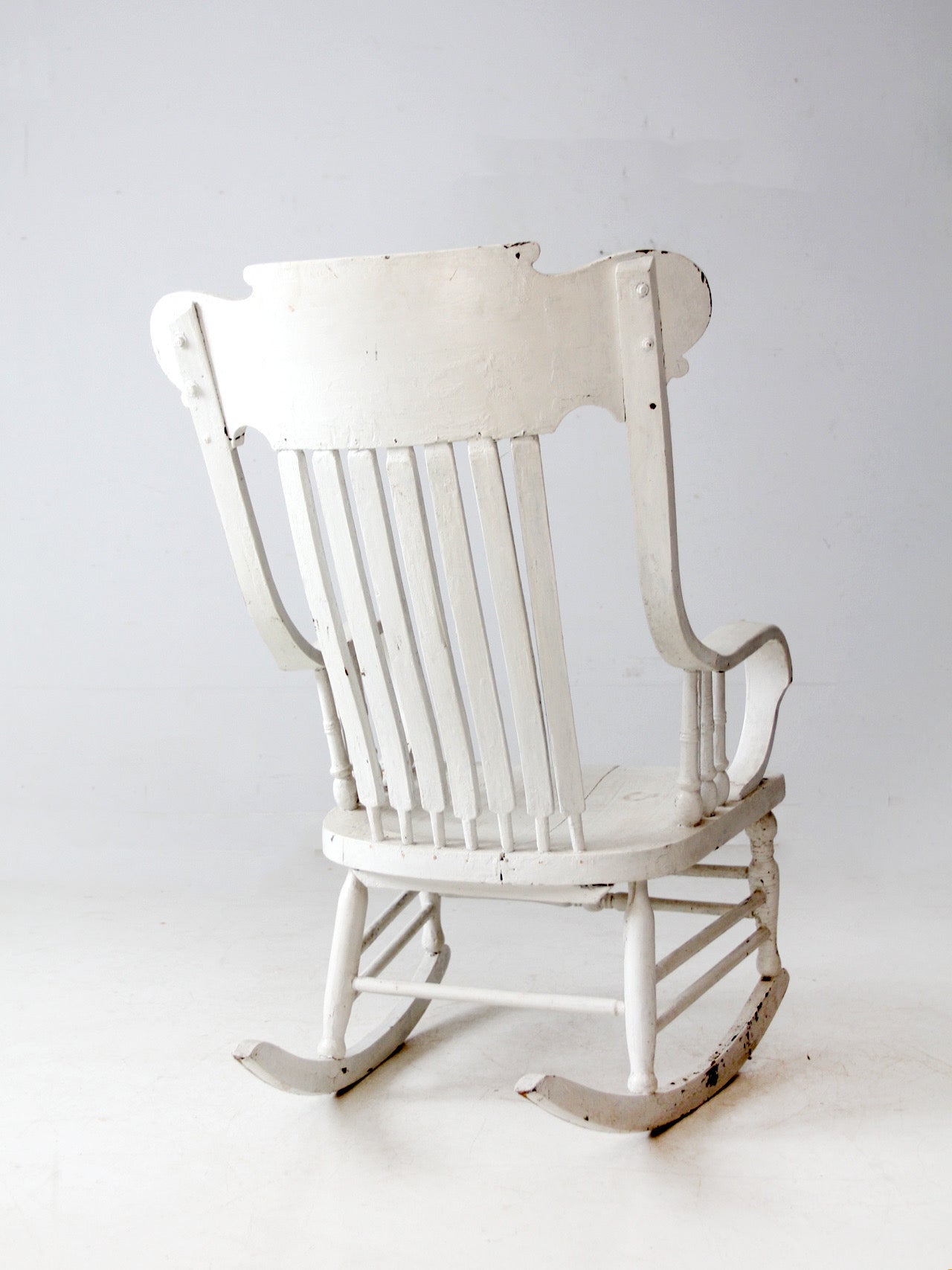 antique white wood rocking chair