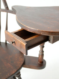 antique Windsor writing armchair with desk and drawers