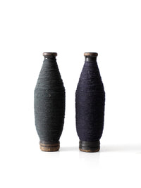 pair of antique wooden thread spools