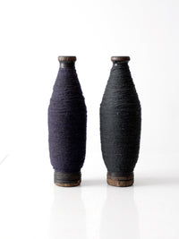 pair of antique wooden thread spools