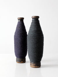 pair of antique wooden thread spools