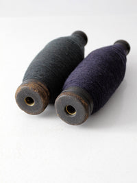 pair of antique wooden thread spools