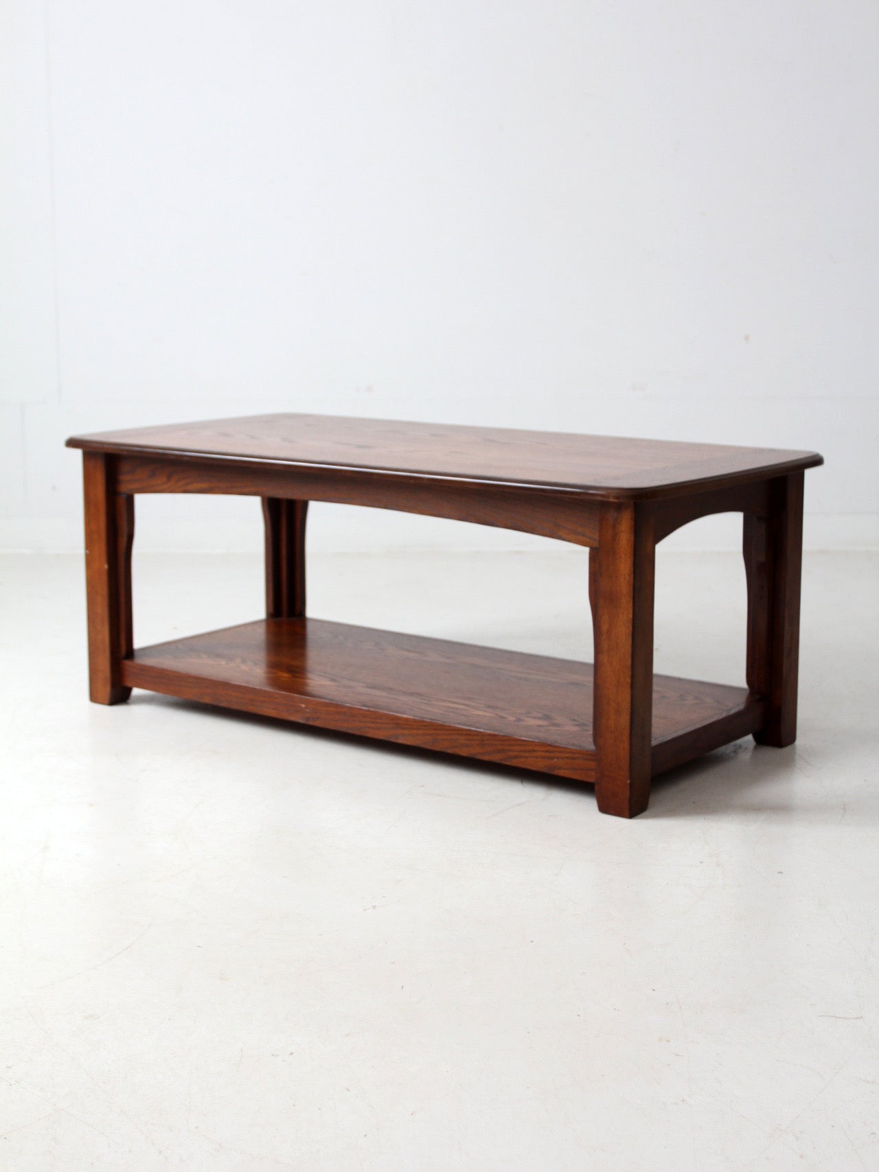 vintage oak coffee table with base shelf