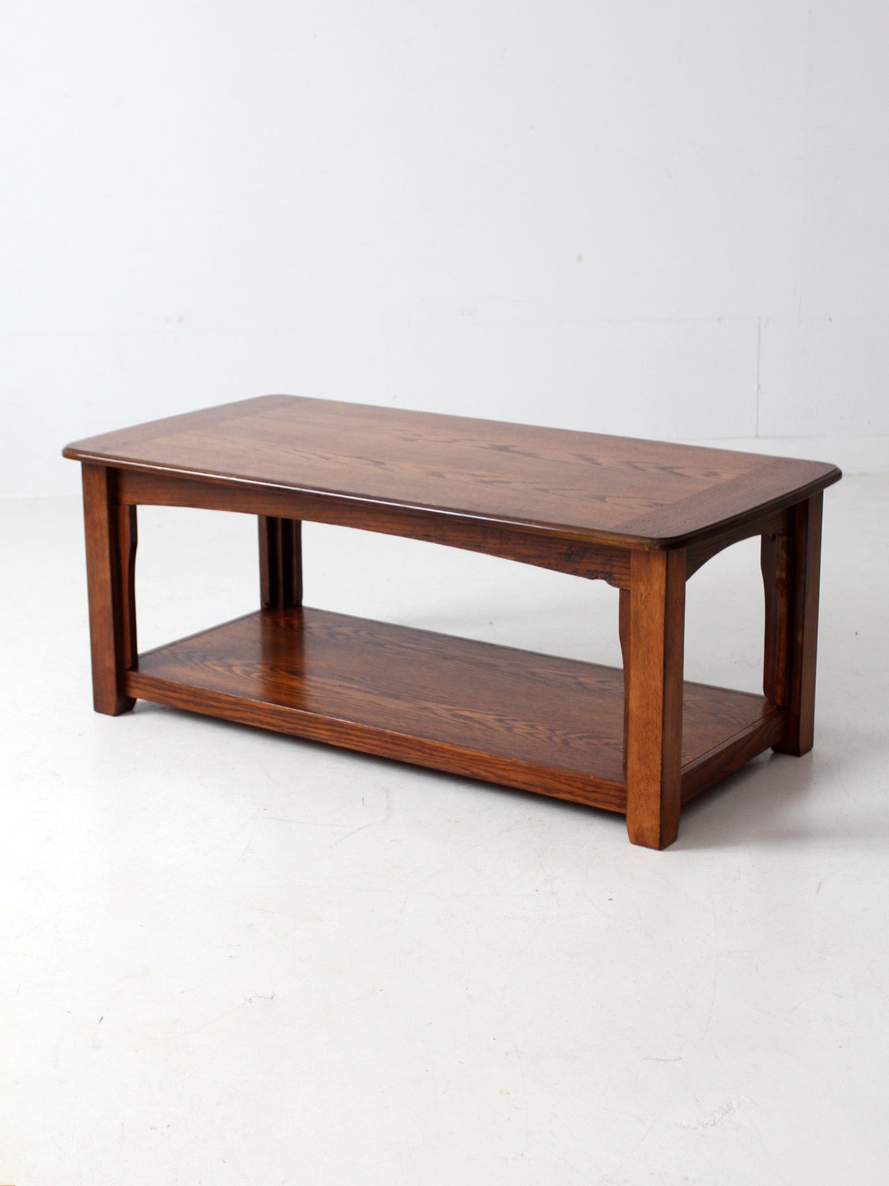 vintage oak coffee table with base shelf