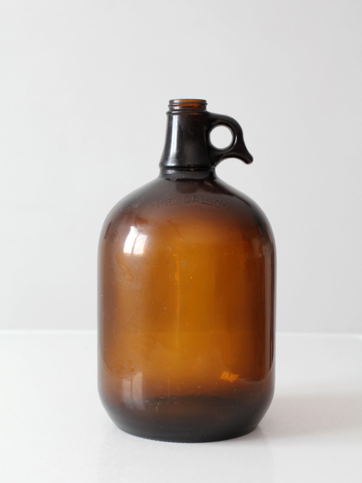 mid-century one-gallon amber glass jug
