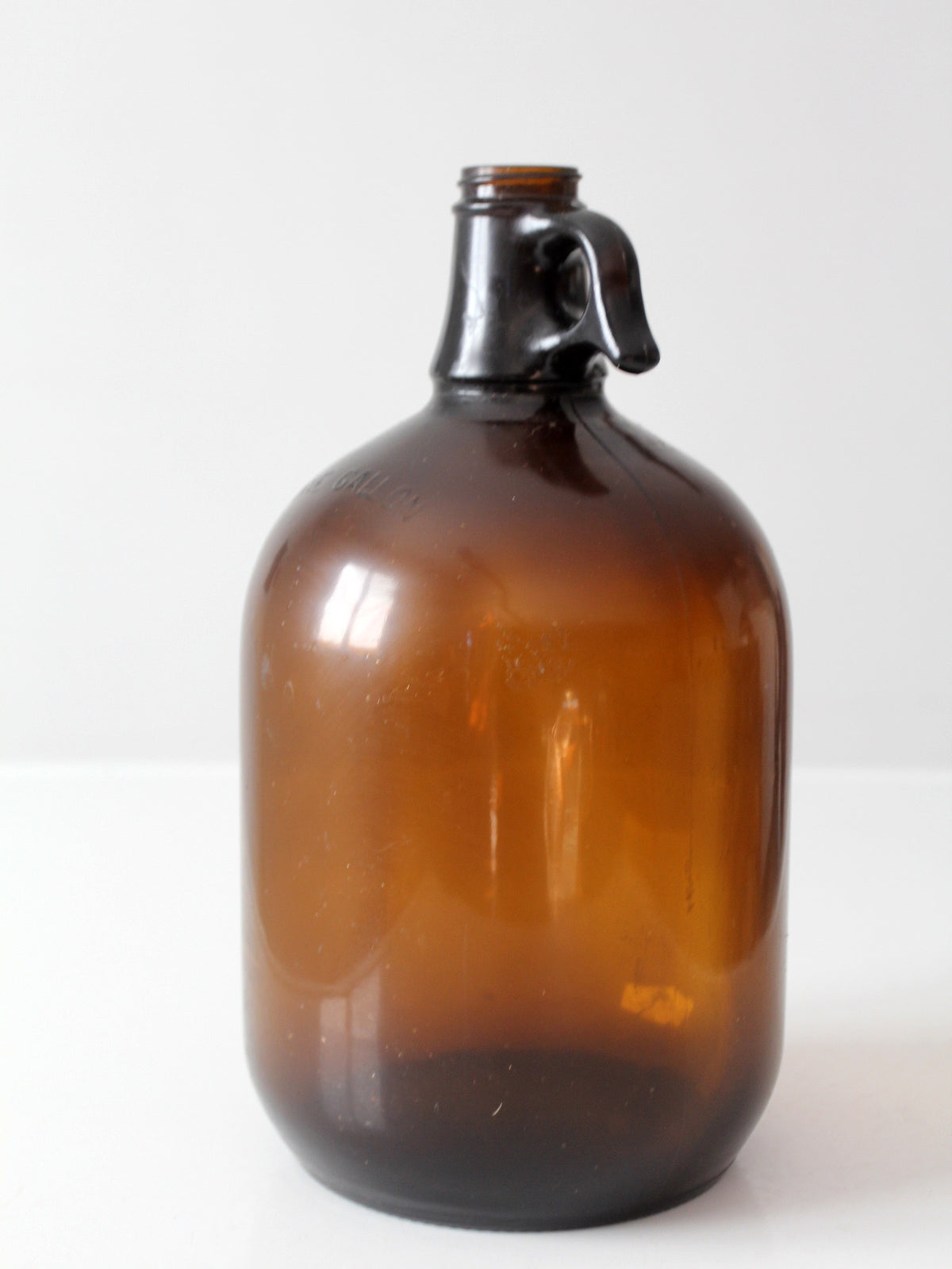 mid-century one-gallon amber glass jug