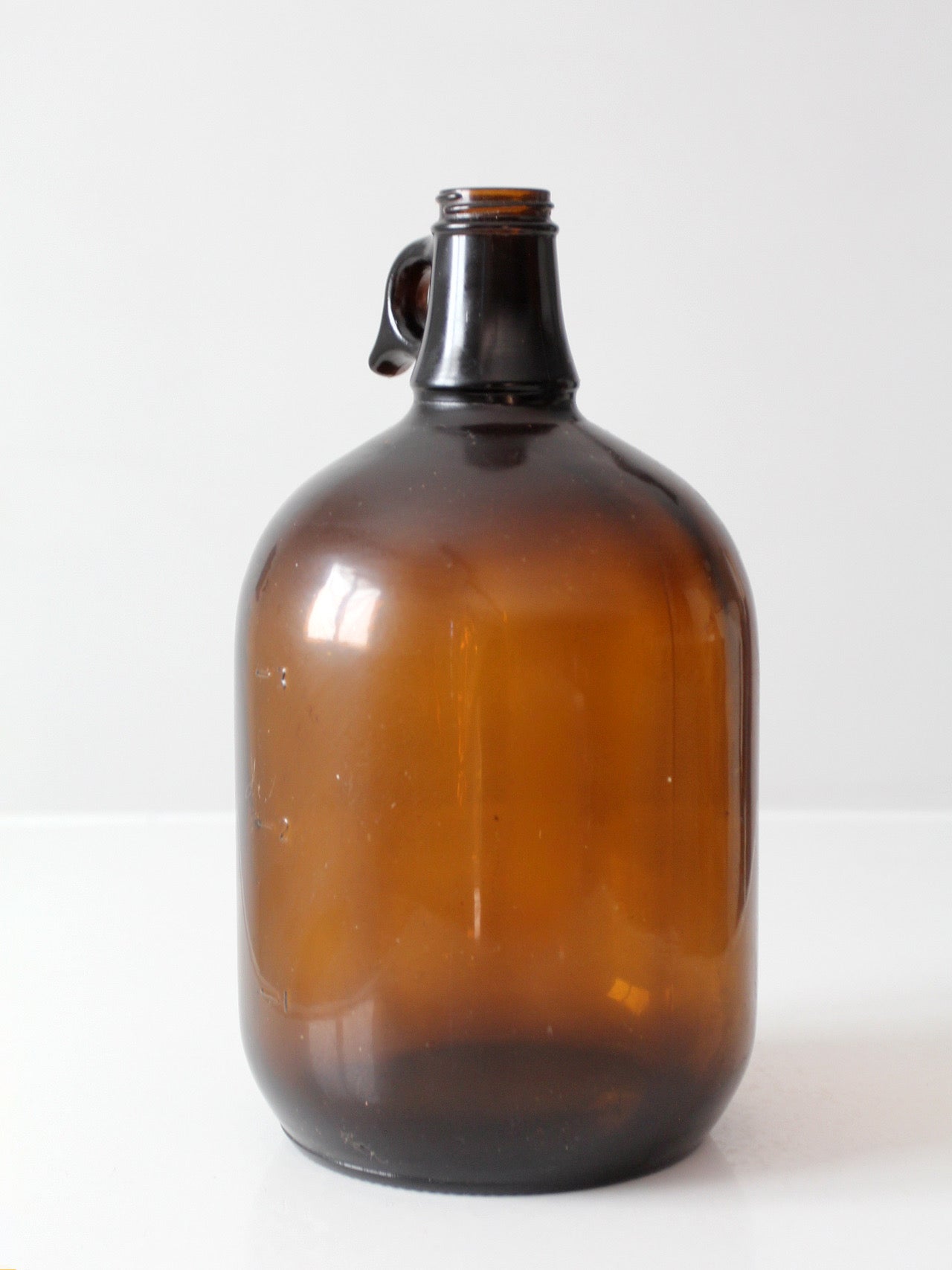 mid-century one-gallon amber glass jug