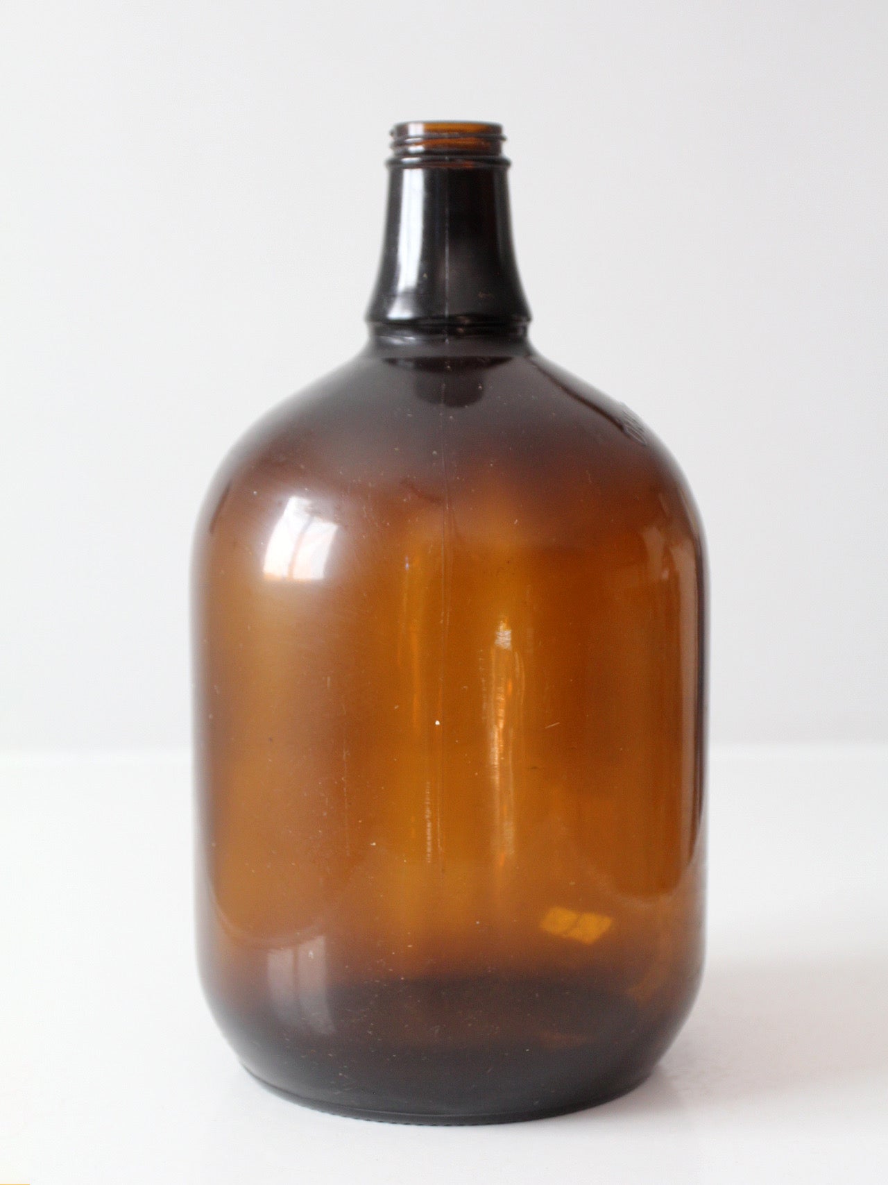mid-century one-gallon amber glass jug