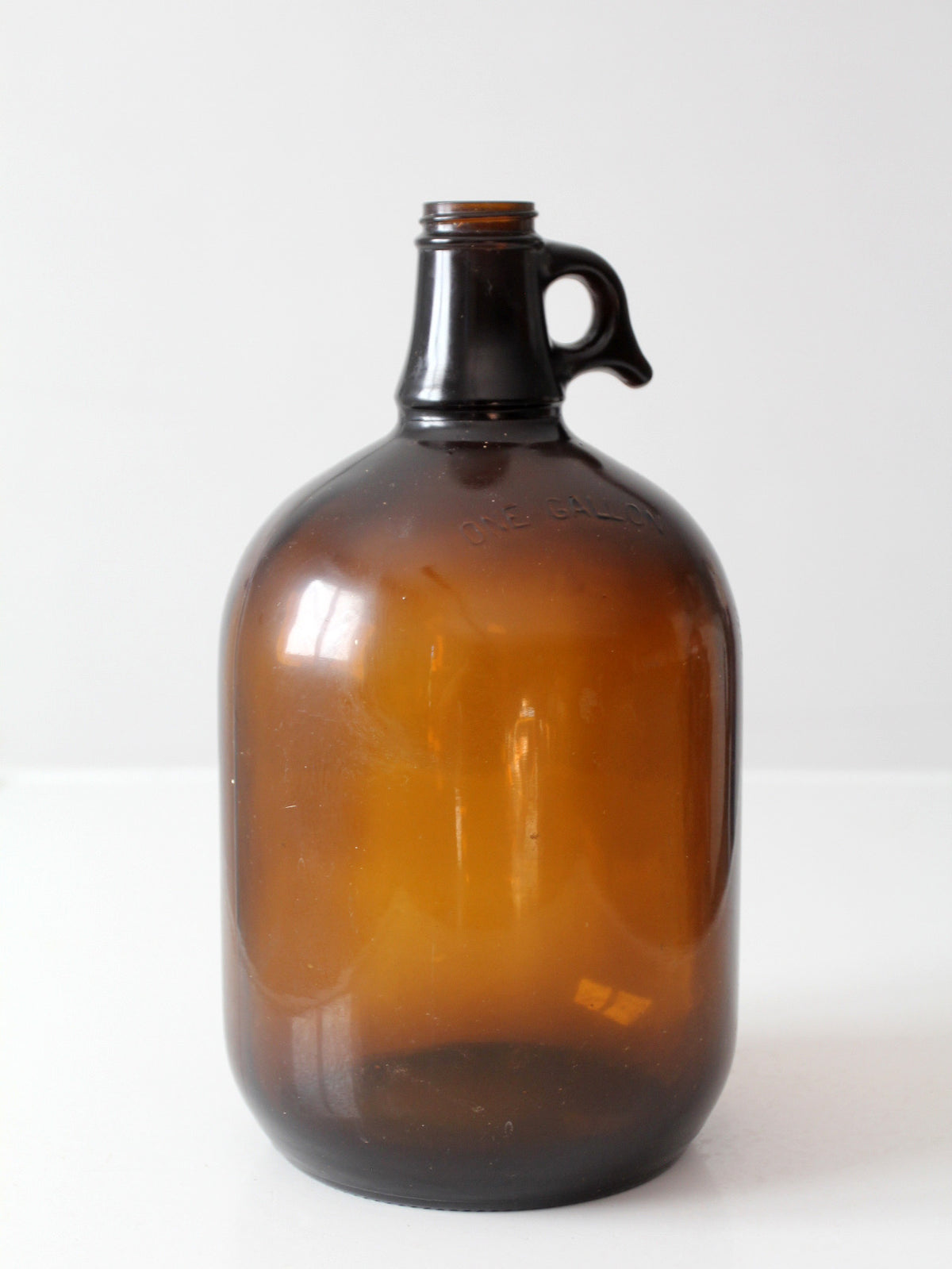 mid-century one-gallon amber glass jug