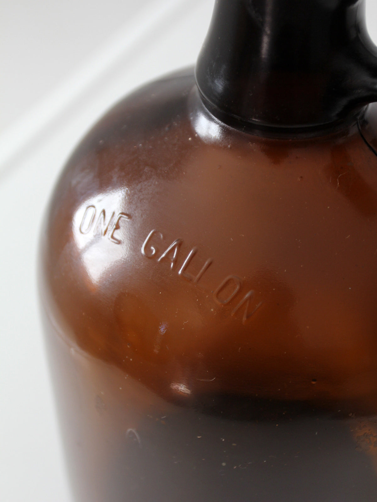 mid-century one-gallon amber glass jug
