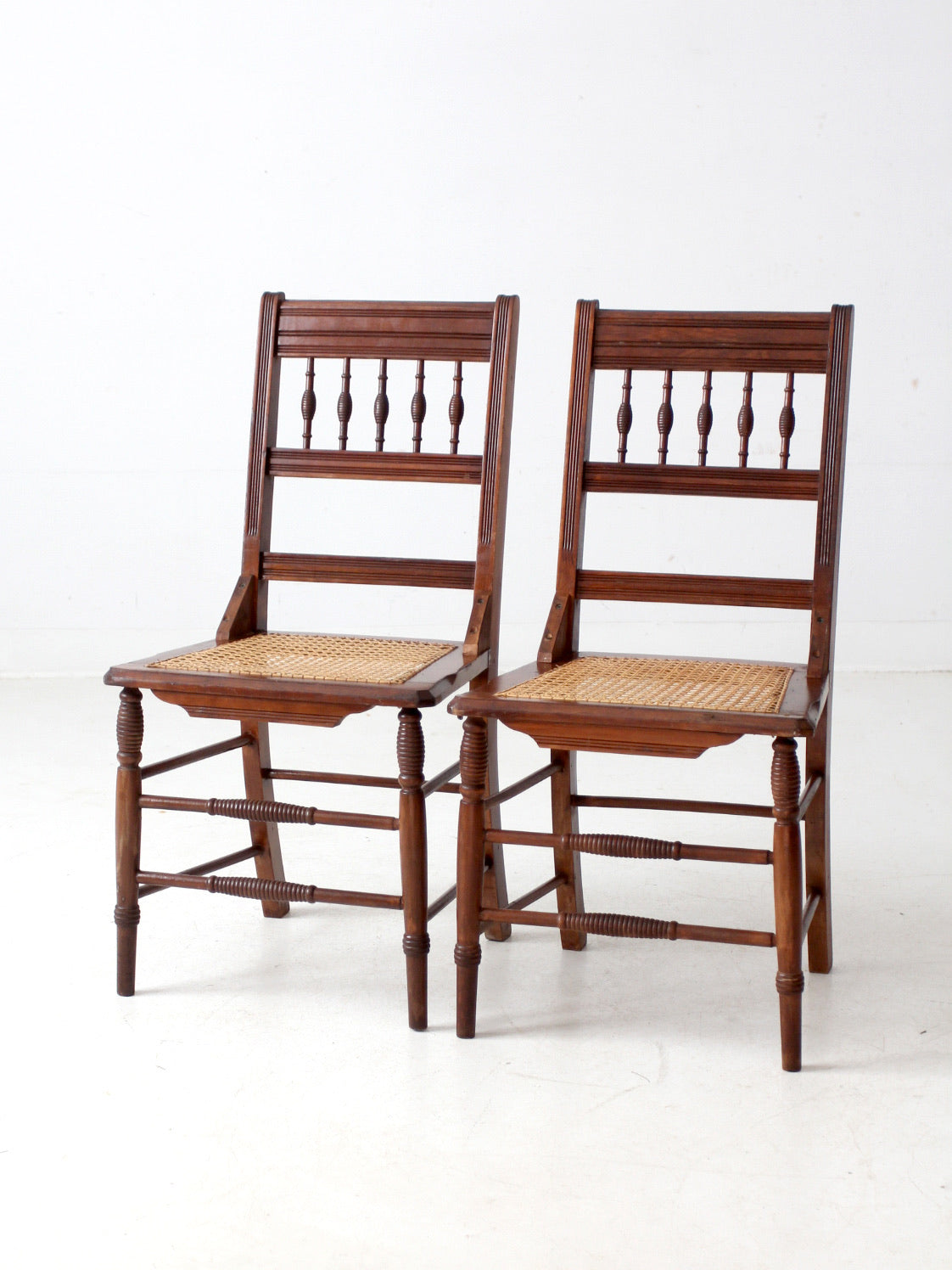 antique Eastlake side chairs with cane seats pair