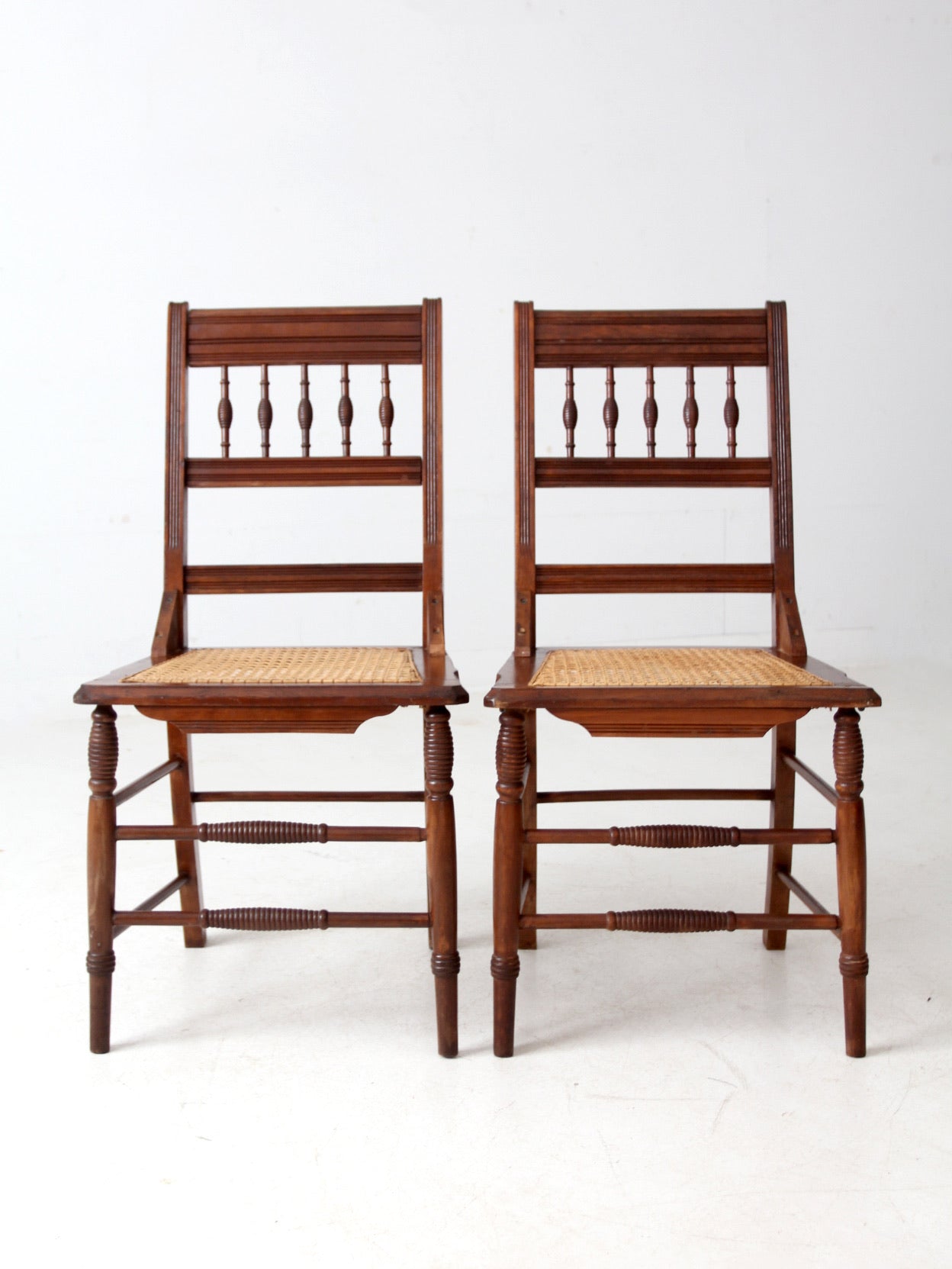antique Eastlake side chairs with cane seats pair