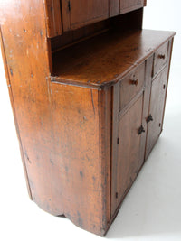 antique step back cupboard