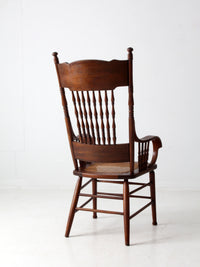 antique pressed back armchair