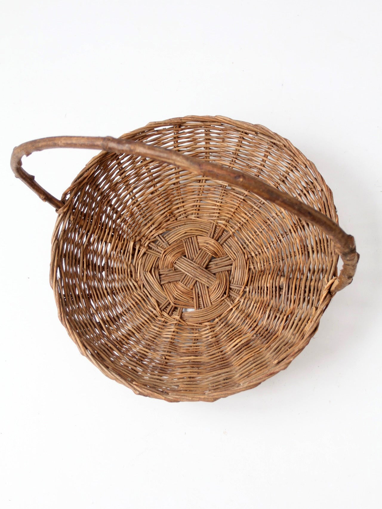 antique willow gathering basket with branch handle