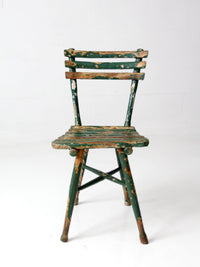 antique green painted rustic Adirondack chair