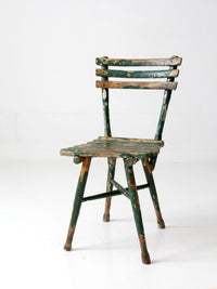 antique green painted rustic Adirondack chair