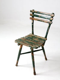 antique green painted rustic Adirondack chair
