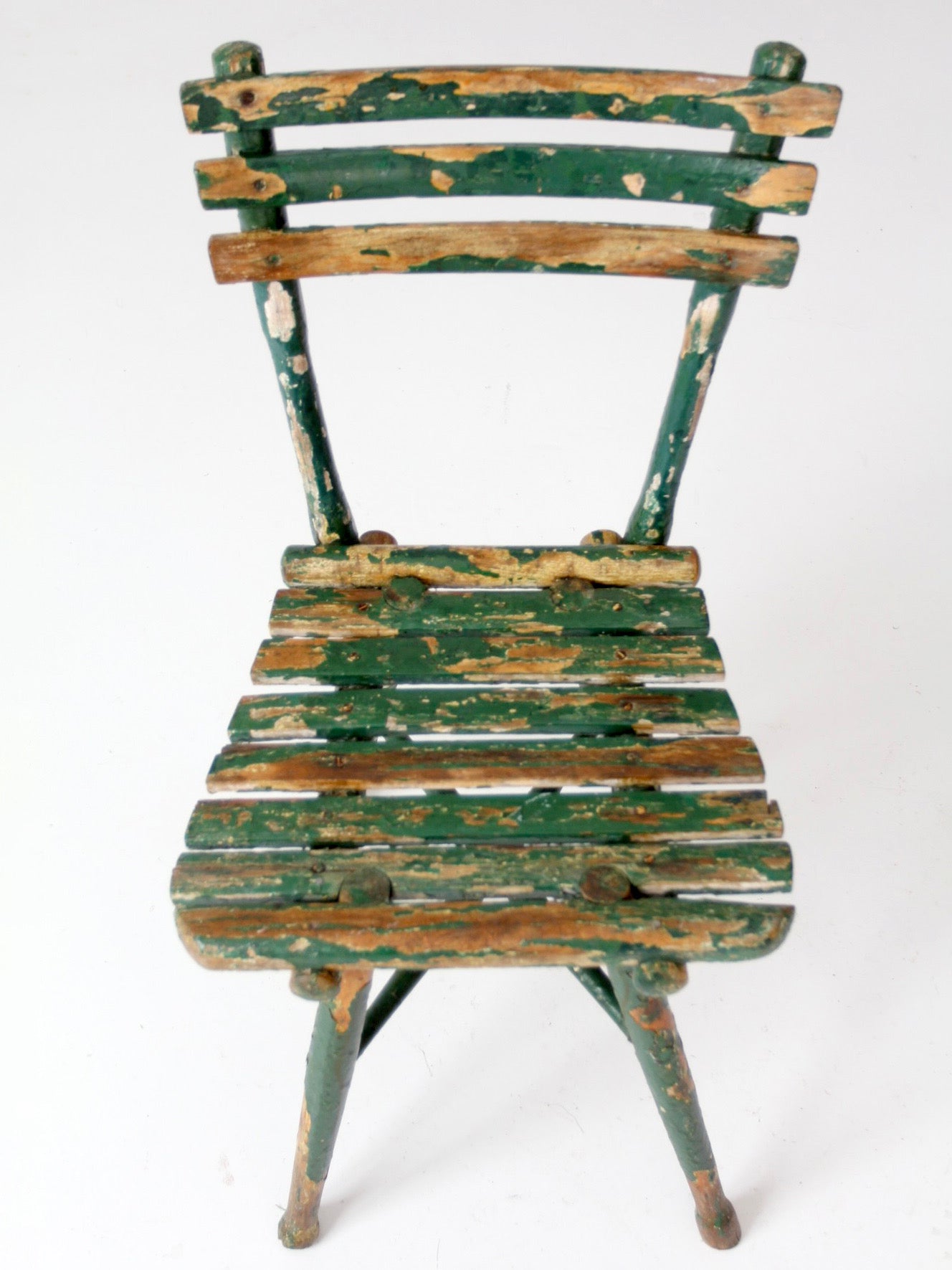 antique green painted rustic Adirondack chair