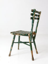 antique green painted rustic Adirondack chair