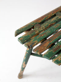 antique green painted rustic Adirondack chair