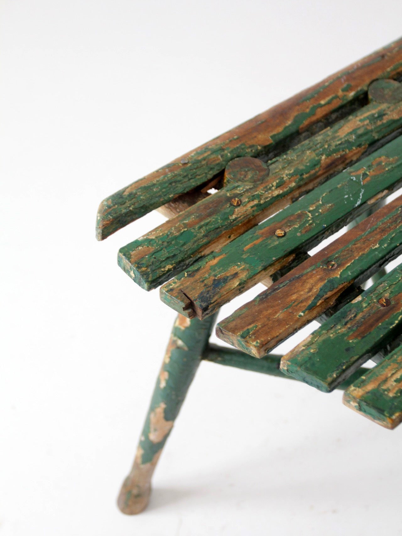 antique green painted rustic Adirondack chair