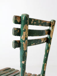 antique green painted rustic Adirondack chair