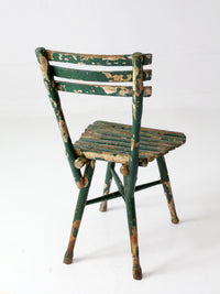 antique green painted rustic Adirondack chair