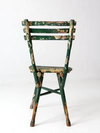 antique green painted rustic Adirondack chair