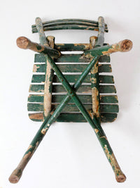 antique green painted rustic Adirondack chair
