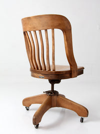 antique Spitzers wood swivel desk chair
