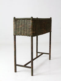 antique green painted wicker jardinière planter with metal liner